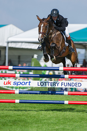 Simon Grieve, (GBR) riding Cornacrew taking part in the Show Jumping Phase
