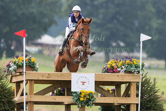 GEORGIE STRANG RIDING RED HOT COOLEY