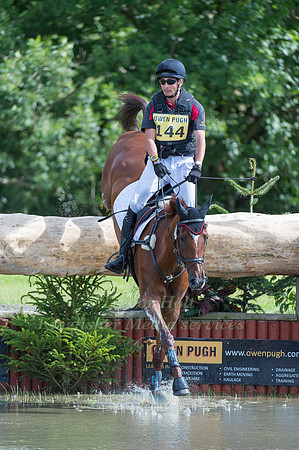 Tian  Alex   Hua(CHN) riding Don Geniro