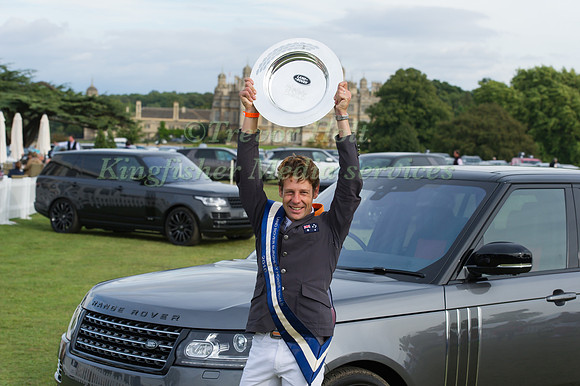 CHRISTOPHER BURTON WITH THE LAND ROVER PERTPETUAL TROPHY