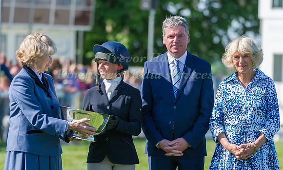Rosalind Canter receiving the Butler Bowl for best British rider, at the 2017 Mitsubishi Motors Horse Trials with the Duchess of Beaufort, Lance Bradley and the Duchess of Cornwall