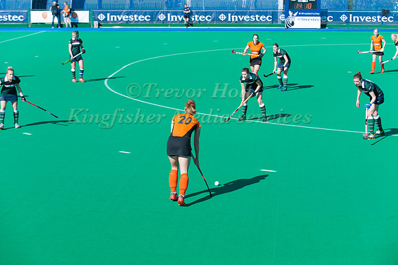 Nicola White looks for a pass