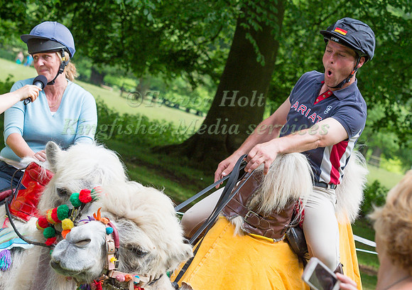 ANDREAS OSTHOLT  AND HILARY MANNERS  AFTER TAKING  PART IN THE CAMEL RACING AT THE 2017 HOUGHTON INTERNATIONAL HORSE TRIALS