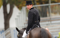 Christopher Burton looksback to check his score in the two star dressage