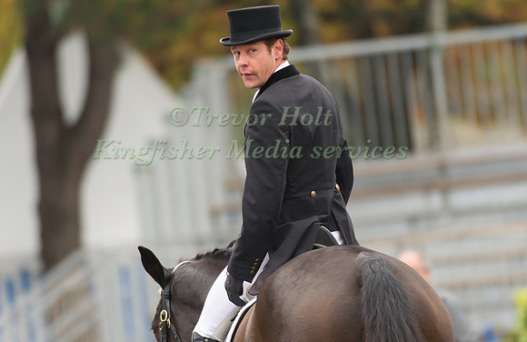 Christopher Burton looksback to check his score in the two star dressage