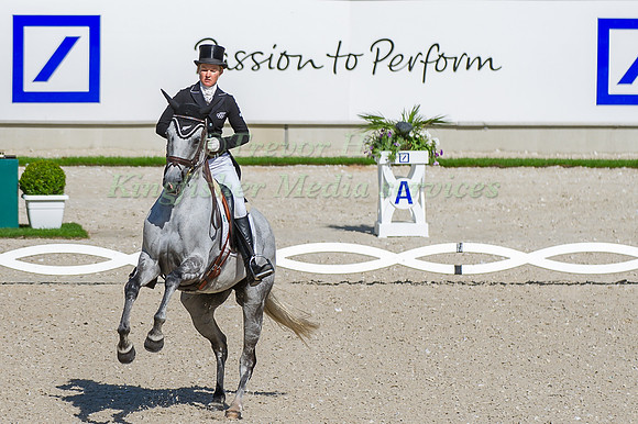 Jonelle Price riding Faerie Dianimo taking part in the dressage test