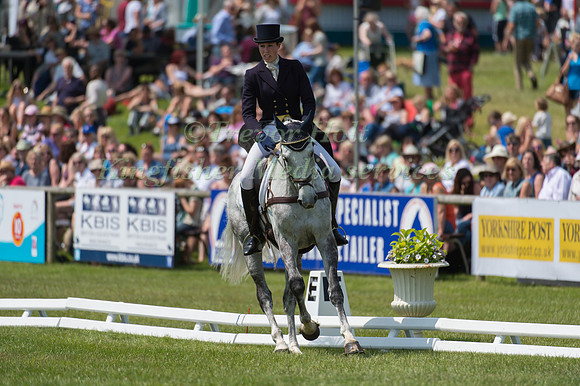 Caroline March (GBR) riding Postmaster