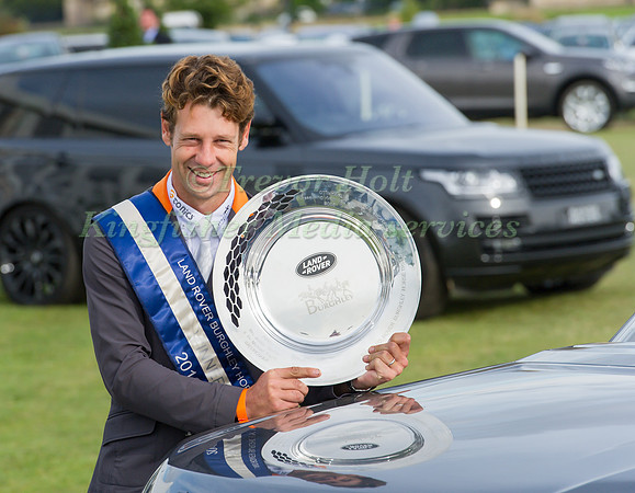 CHRISTOPHER BURTON WITH THE LAND ROVER PERTPETUAL TROPHY