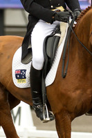 Bill Levett goes into the lead despite loosing his stirrup.