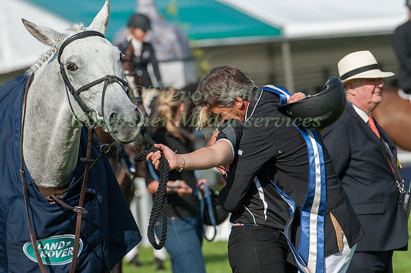 Andrew Nicholson celebrates with groom after winning Burghley horse Trials