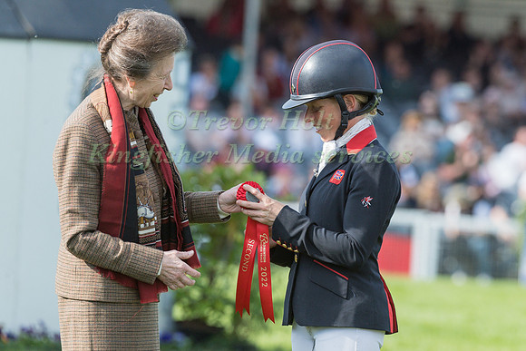 Ros Canter  recieving  Her rosette from the Princess Royal