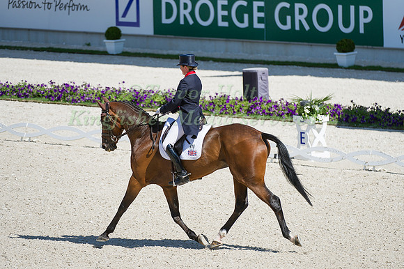 Piggy French riding Jakata taking part in the dressage test