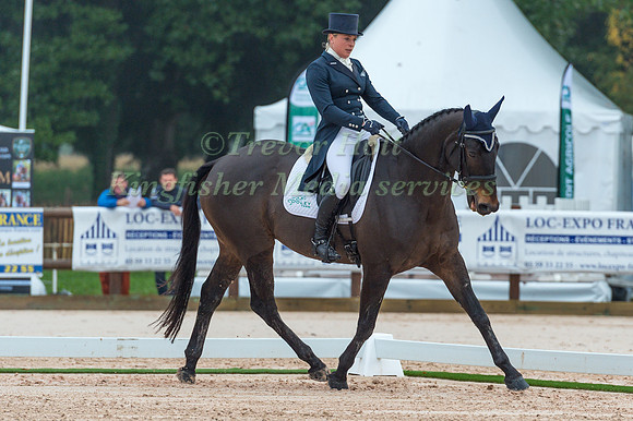 Katie O' Sullivan (IRL riding Cooley Blue Flame