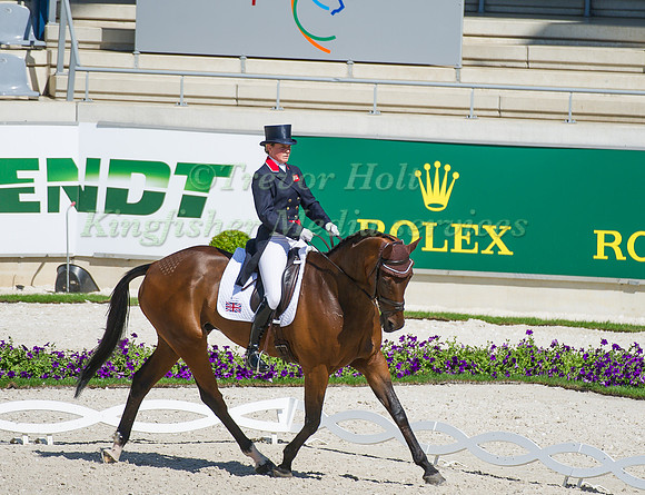 Piggy French riding Jakata taking part in the dressage test