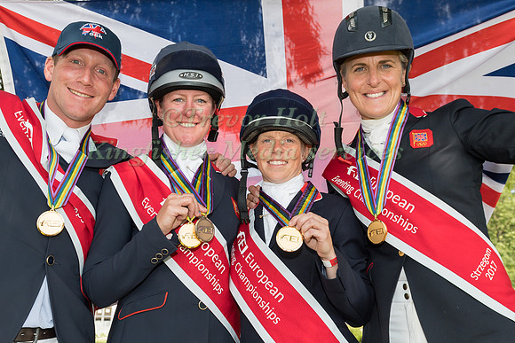 TEAM GBR WINNERS OF THE EUROPEAN EVENTING CHAMPIONSHIP STRZEGOM 2017 HOLDING A UNION FLAG
