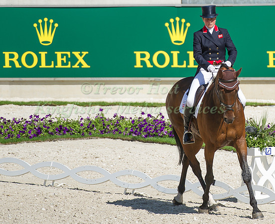 Piggy French riding Jakata taking part in the dressage test