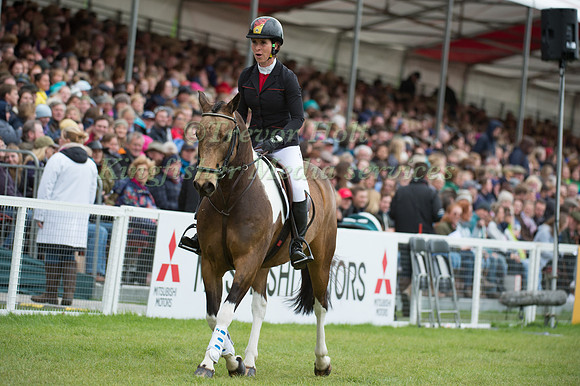 Bettina Hoy takes part in the parade of competitors on a borrowe