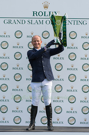 Michael Jung of Germany  with the Rolex  Grand Slam of Eventing Trophy