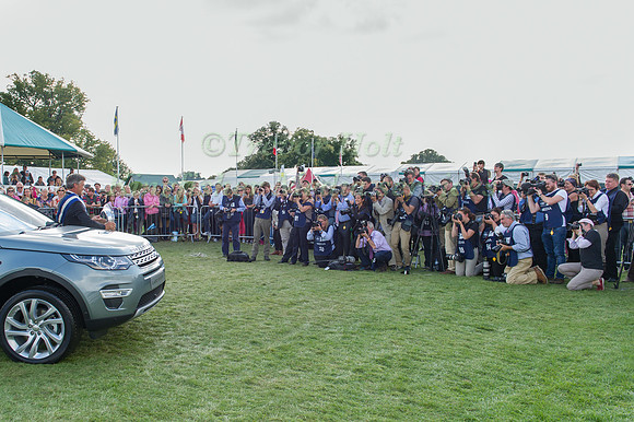 Andrew Nicholson (NZL) with the Land Rover Burghley Horse Trials Trophy being photographed