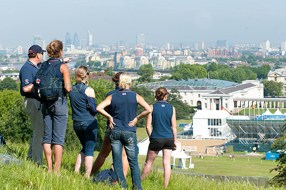 Will Connell and members of the British support team look out over the London sky line from Greenwich Park