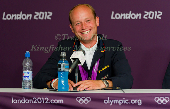 Michael Young Olympic Double Gold Medalist celebrates his winning round