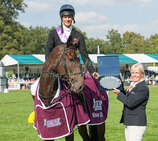 Jonathan Paget is Presented with FEI Classics Trophey by Catrin Norlinder at Burghley Horse Trials on September 7, 2014 in Stamford, England.