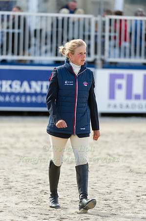 Izzy Taylor walking the Show Jumping course
