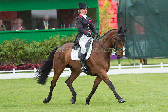Kristina Cook (GBR) riding De Novo News