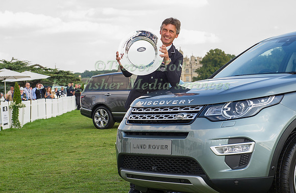 Andrew Nicholson in Front of Burghley House with the Land Rover Trophy at the Burghley Horse Trials on September 7, 2014 in Stamford, England.