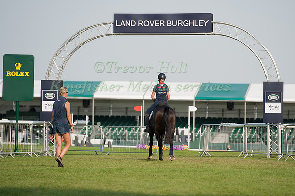 Nicola Wilson and Opposition Buzz entrer the dressage arena for acclimatisation