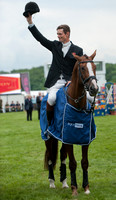 William Fox-Pitt winner of both the CIC and CCI three Star competitions wave to the crowd in the main arena