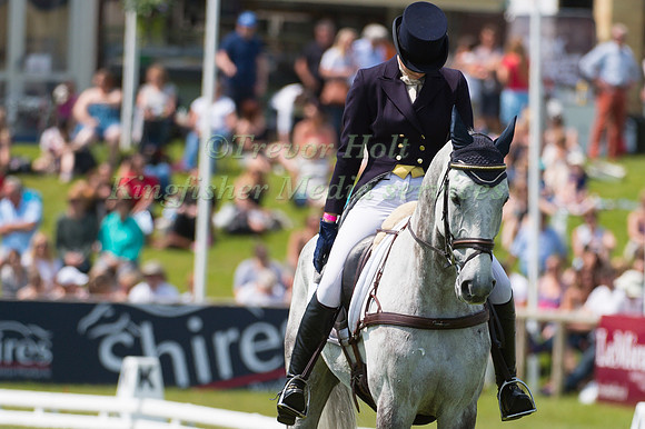 Caroline March (GBR) riding Postmaster