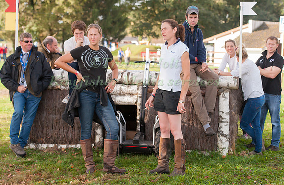 Riders wait for the racecourse section of the four star course to be opened .