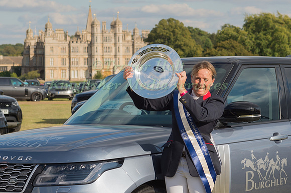 Pippa Funnell winner of the 2019 competition with the Landrover Plate in Front of Burghley House