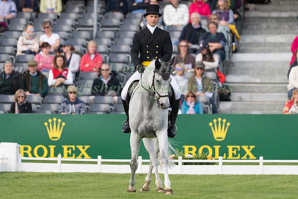 HARRY DZENIS (GBR) RIDING  XAM