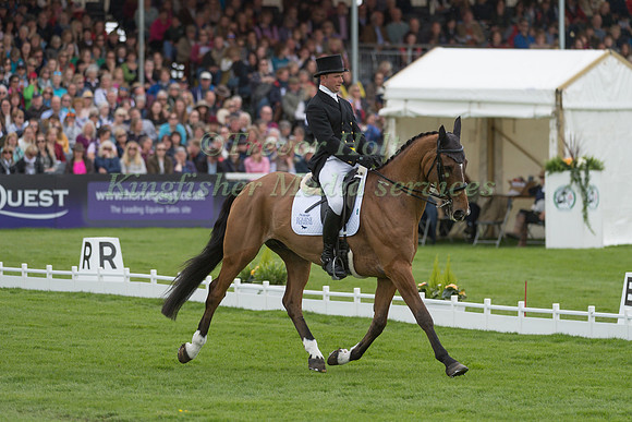 HARRY DZENIS (GBR) RIDING  DROMGURRIHY BLUE