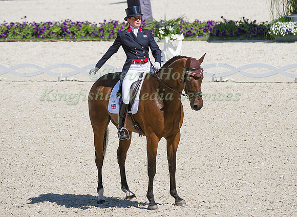 Piggy French riding Jakata taking part in the dressage test