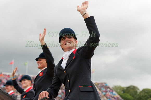 Kristina Cook waves to the crowd