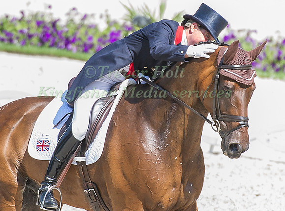Piggy French riding Jakata taking part in the dressage test