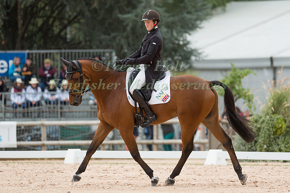 Tom McEwen (GBR) riding Toledo De Kerser