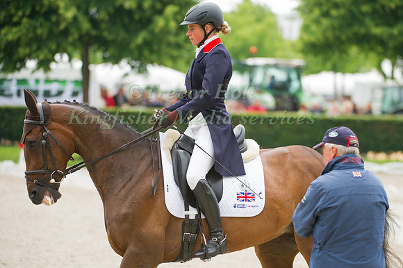 Izzy taylor warms up for her dressage test with Yogi