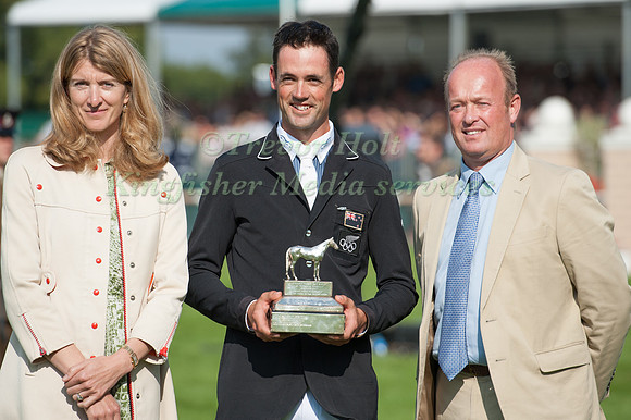 Jonathan Paget (NZL) recieving the Sugden Challenge Trophy pictured with Miranda Rock, President of the Land Rover Burghley Horse Trials Commitee and Jeremy Hicks managing Director of Land Rover UK