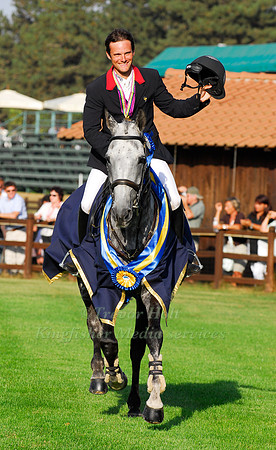 Nicolas Touzaint celebrates Individual Gold and Team Silver