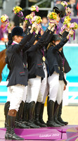 The Medal Winning Teams Wave to The Crowd