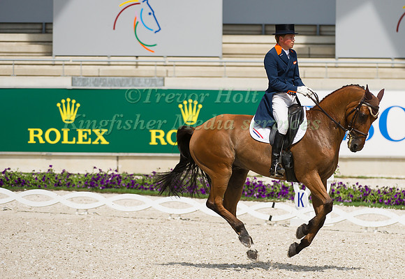 Tim Lips riding Concrex Oncarlos taking part in the dressage test