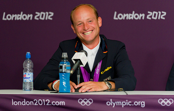 Michael Young Olympic Double Gold Medalist celebrates his winning round