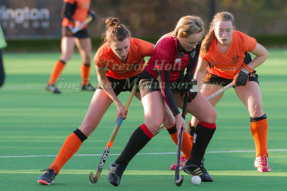 Tina Cullen fends off Hannah Fair and Emily Kilner