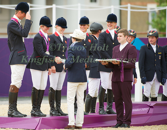 The Silver Medal Winning British team recieve their medals from Princess Anne