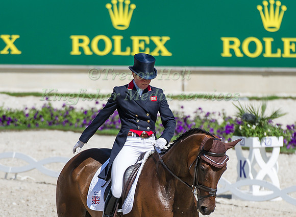Piggy French riding Jakata taking part in the dressage test