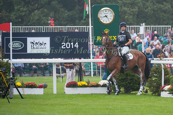 Harry Dzenis (GBR) riding Dromgurrihy Blue waits in the starting Gate
